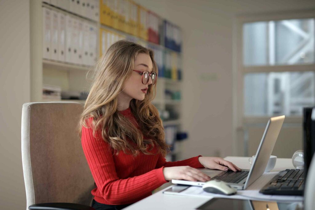 Photo of health care manager using laptop