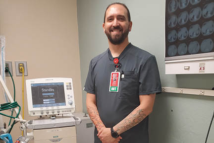 photo of graduate Travis W
